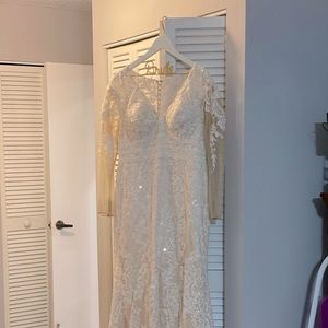 Oleg Cassini beautiful trumpet style beige beaded dress, long sleeves and train.